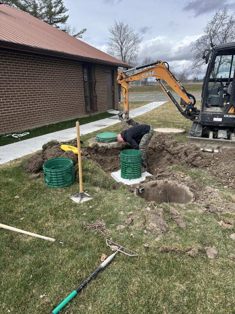 septic riser installation
